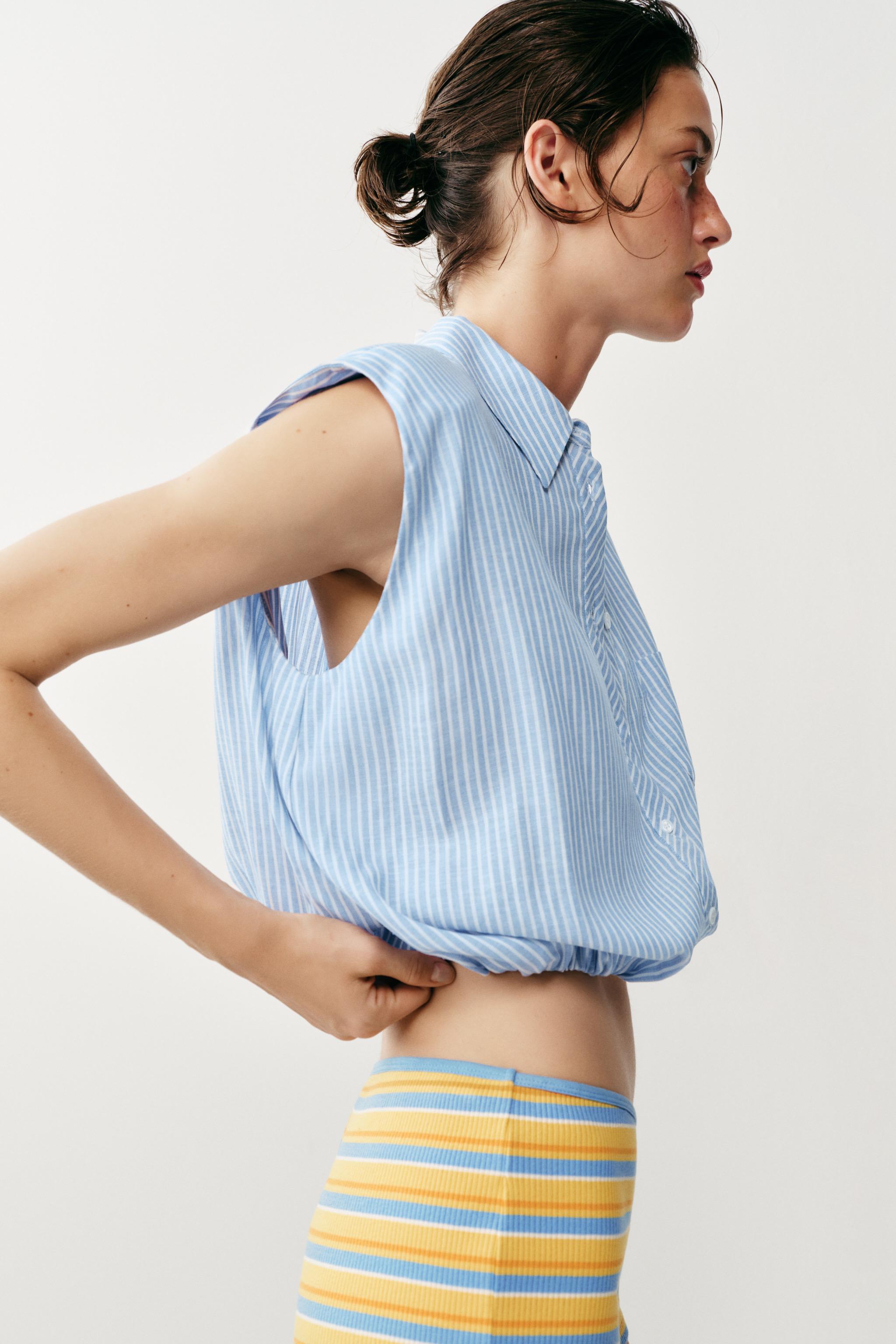 SHORT STRIPED SHOULDER PAD SHIRT